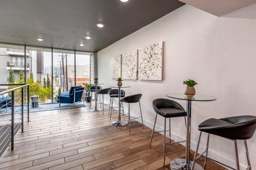 Clubhouse with tables and lounge chairs