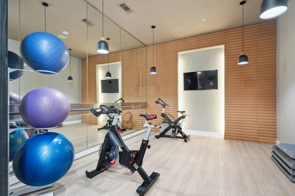 Fitness center with cardio and strength training machines