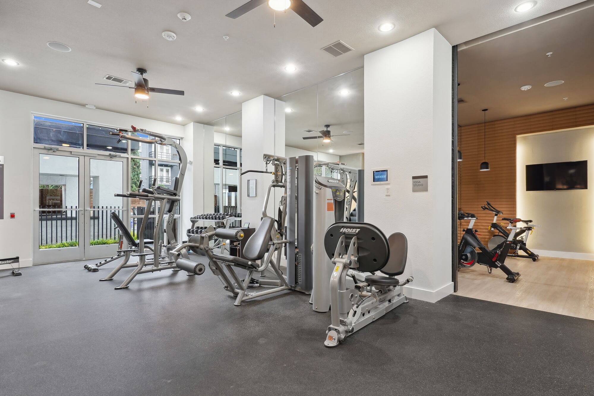 Fitness center with cardio and strength training machines