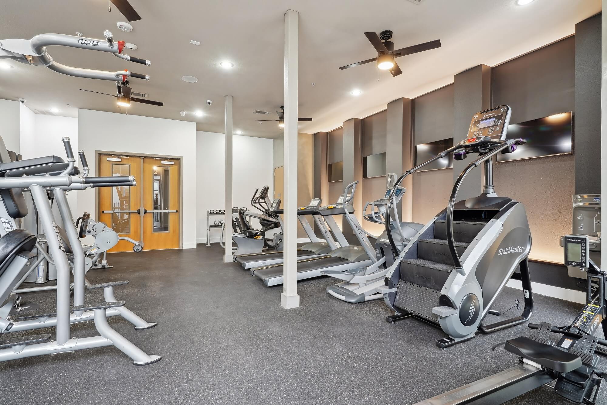 Fitness center with cardio and strength training machines