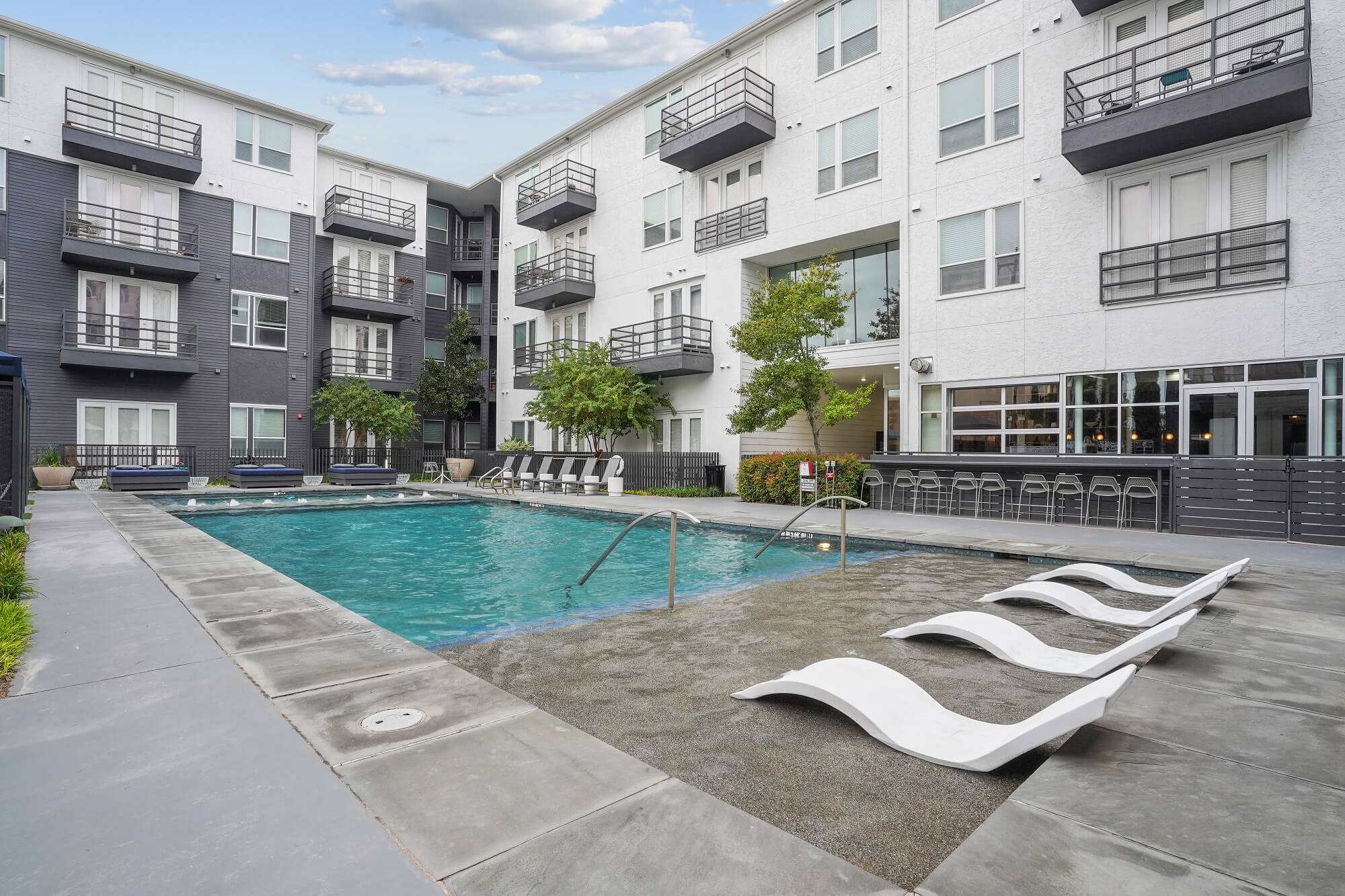 Pool courtyard with deck seating